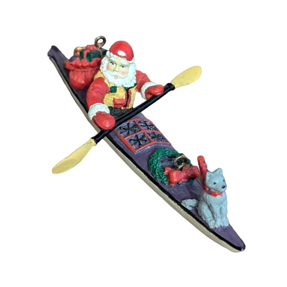 Santa on a Kayak Christmas Ornament